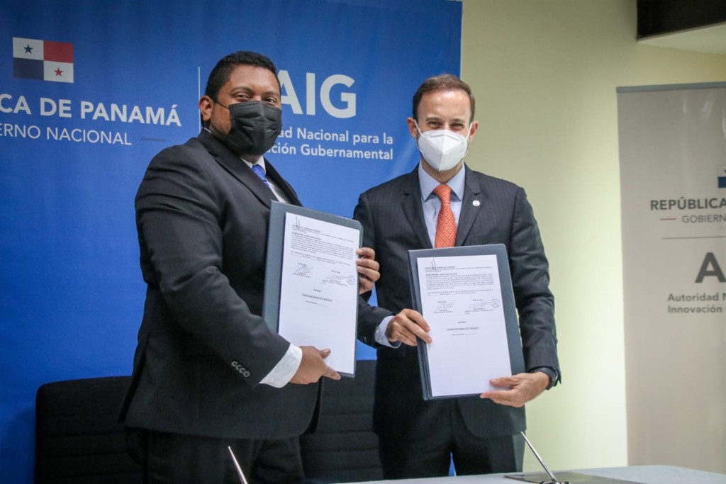 Firma de convenio con AIG para pagos con cédula