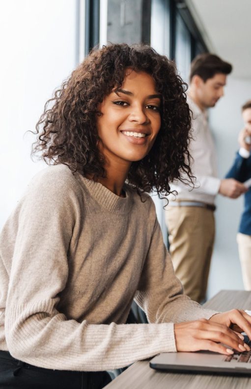 Attractive,African,Young,Confident,Businesswoman,Sitting,At,The,Office,Table
